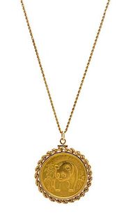 * A 14 Karat Yellow Gold and Chinese 100 Yuan Panda Coin Pendant, 27.40 dwts.