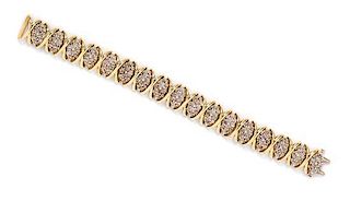 A 14 Karat Yellow Gold and Diamond Bracelet, 23.00 dwts.