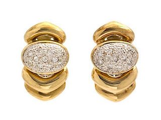 A Pair of 14 Karat Yellow Gold and Diamond Earclips, 9.10 dwts.