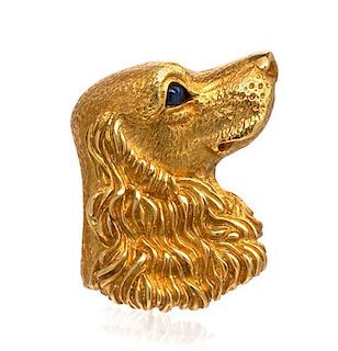 An 18 Karat Yellow Gold and Sapphire Dog Brooch, Tiffany & Co., Germany, Circa 1989, 6.60 dwts.