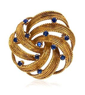 A Yellow Gold and Sapphire Swirl Brooch, Tiffany & Co., 12.30 dwts.