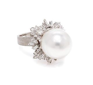 * A 14 Karat White Gold, Cultured Pearl and Diamond Ring, 10.90 dwts.