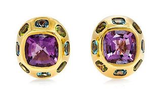 A Pair of 18 Karat Yellow Gold, Amethyst, Peridot and Blue Topaz Earclips, 19.60 dwts.