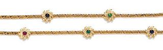 A Yellow Gold, Diamond, Ruby, Sapphire and Emerald Longchain Necklace, 37.10 dwts.