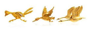 A Collection of Yellow Gold, Ruby and Diamond Bird Brooches, 22.10 dwts.
