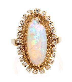 * A Yellow Gold, Opal and Diamond Ring, 5.60 dwts.