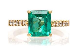 A 14 Karat Yellow Gold, Emerald and Diamond Ring, 3.50 dwts.