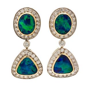 A Pair of 14 Karat Yellow Gold, Opal and Diamond Earclips, 5.30 dwts.
