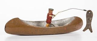FOLK ART CARVED AND PAINTED FIGURE OF A FISHERMAN