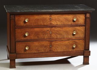 French Empire Style Carved Walnut Marble Top Commode, 19th c., the figured black marble over three setback drawers, flanked by applied pilasters, on a