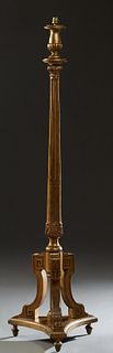 French Louis XVI Style Carved Gilt Beech Torchere Lamp, early 20th c., with a single socket on a turned tapered reeded support to a socle with curved 