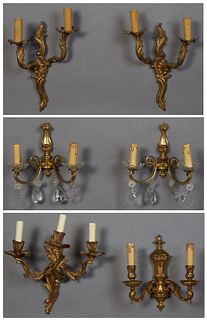 Group of Six French Bronze Sconces, 20th c., consisting of a pair of two light Louis XV examples, with leaf form back plates; a pair of Louis XVI styl