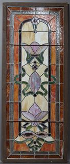 Victorian Style Leaded Stained Glass Window, 20th c., with floral decoration and cabochon "jewels," presented in a pine frame, Glass- H.- 72 1/2 in., 