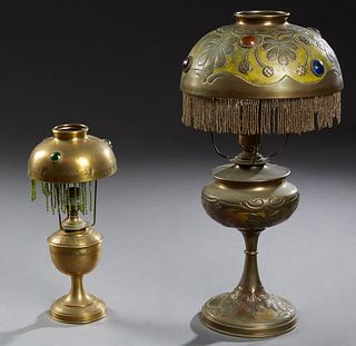 Two French Art Nouveau Brass Repousse Lamps, c. 1910, with jeweled shades, with beaded trim, H.- 12 in., W.- 5 1/2 in., H.- 19 in., W.- 9 1/2