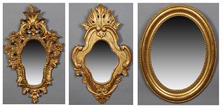 Group of Three French Gilt and Gesso Louis XV Style mirrors, one oval form gold leaf example with a beaded interior; one of cartouche form with pierce