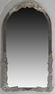French Wrought Iron Overmantle Mirror, early 20th c., the arched top with relief leaf mounts, around a conforming mirror plate, flanked by like relief