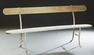 French Iron and Pine Garden Bench, 19th c. and later, with a single slat back on curved flat wrought iron support, to a single rounded slat seat, on f