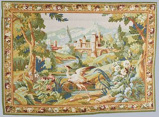French Wool Tapestry, 20th c., by Robert Four Co., after the 18th c. original, depicting a stork in a chateau garden, the top with a sewn in wood hang