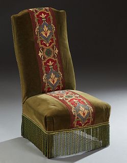 French Carved Mahogany Upholstered Side Chair, c. 1870, the high canted back over a bowed seat, on cabriole legs, upholstered in green velvet with a c