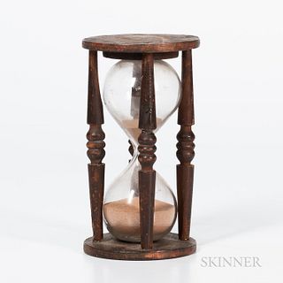 Turned Wood Hourglass, early 19th century, the circular ends joined by turned spindles and the blown glass, ht. 6 1/4 in.