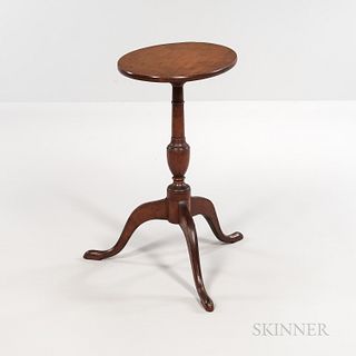 Federal Cherry Candlestand, probably Connecticut, c. 1790-1800, the oval top on a well-turned support on tripod cabriole leg base endin