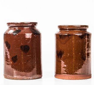 Two Glazed Redware Jars, New England, mid-19th century, straight-sided jars with manganese splotch decoration, (minor rim and glaze chi