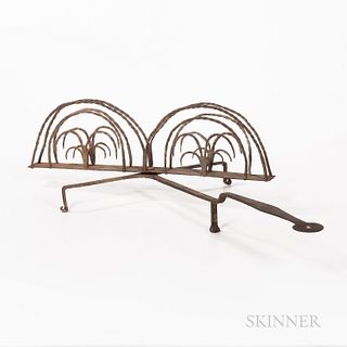 Large Wrought Iron Toaster, America, 19th century, the swivel toasting rack with twisted iron sides and long handle, lg. 24, wd. 21 in.