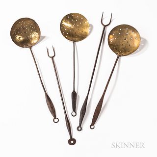 Five Wrought Iron and Brass Hearth Tools, 19th century, three skimmers and two forks, each with circular hangers on the ends of the han