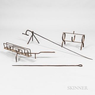 Four Wrought Iron Hearth Tools, 19th century, a footed roasting spit, a long skewer, a toaster, and a pipe kiln, lg. to 48 in.
