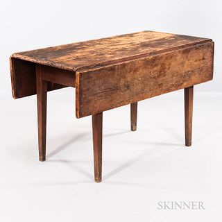 Pine and Cherry Drop-leaf Table, probably Connecticut, c. 1810, the breadboard top with falling leaves on square tapering legs joined b