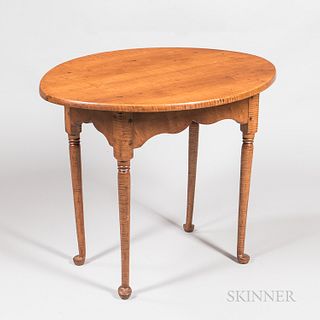 Queen Anne Tiger Maple Tea Table, New England, 18th century, the oval overhanging top on turned tapering legs ending in pad feet joined