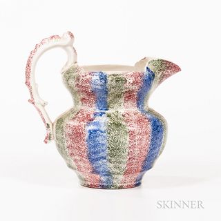 Red, Green, and Blue Rainbow Spatterware Pitcher, England, mid-19th century, the shaped and molded body with scrolled and molded handle