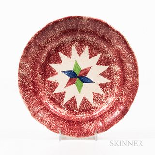 Red Spatterware "Star" Pattern Plate, England, 19th century, the plate with paneled rim and allover red spatter centering a twelve-poin