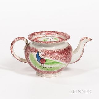 Red Spatterware "Peafowl" Pattern Teapot, England, 19th century, bulbous form with allover red decoration and peafowl with blue neck, r