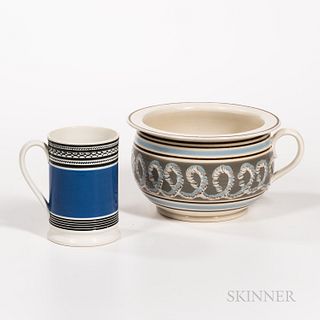Two Slip-decorated Items, England, early 19th century, a pint mug with engine-turned black bands and a wide royal blue band, and a cham
