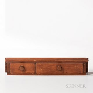 Shaker Two-drawer Wall Shelf, the shelf with beveled edge above the drawers, ht. 4 1/4, wd. 23, dp. 5 1/4 in. Provenance: Upton Collect
