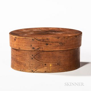 Shaker Covered Oval Box, with two swallowtails on base, old surface, (stains to top), ht. 3, wd. 6, dp. 3 3/4 in.  Provenance: The Shak