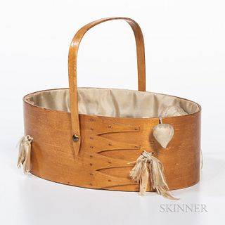 Shaker Oval Sewing Carrier, New Lebanon, c. 1950, with blue lined interior, four swallowtails, and swing handle, (wear to interior silk