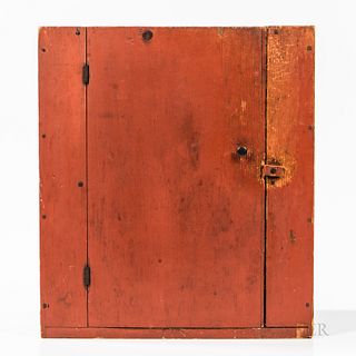 Small Red-painted Pine Hanging Cupboard, New England, early 19th century, the nail-constructed case with door opening to two shelves, o