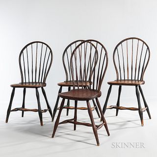 Set of Four Painted Bow-back Windsor Chairs, New England, c. 1810, each with seven spindles, the shaped seats on splayed double-swelled