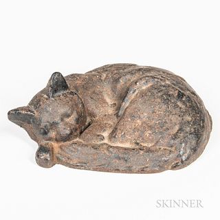 Black-painted Cast Iron Sleeping Cat Doorstop, possibly Bradley and Hubbard, c. 1900-20, (rust and paint wear), lg. 14 1/4 in. Provenan