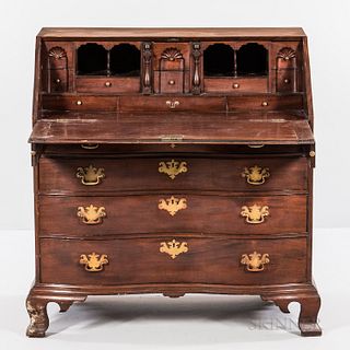 Chippendale Carved Mahogany Oxbow Serpentine Slant-lid Desk, Massachusetts. c. 1760-80, the stepped interior of fan-carved blocked draw