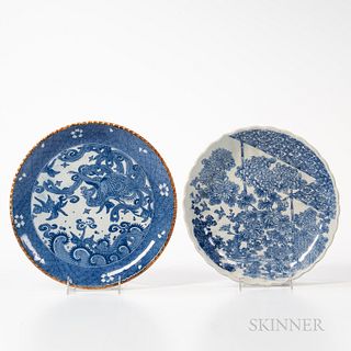Two Blue and White Porcelain Plates, China, 19th century, one with scalloped rim and decoration of flowers under a shade, the other wit