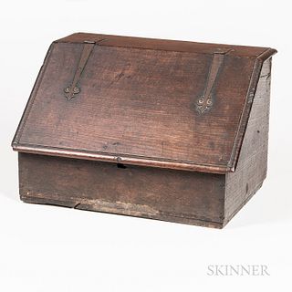 Oak Slant-lid Box, England, late 18th century, the box with molded edge and hinged lid with wrought iron strap hinges opens to an inter