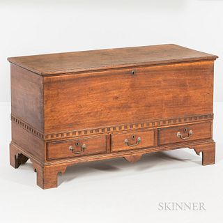 Carved Walnut Dower Chest, Pennsylvania or New Jersey, late 18th century, with molded top opening to a lidded till and drawer, the dove
