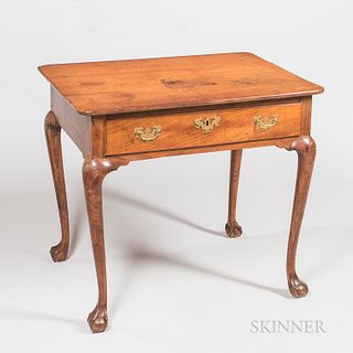 Chippendale Carved Walnut Table, possibly Pennsylvania, c. 1760-80, the top with rounded corners on a valanced apron with thumb-molded