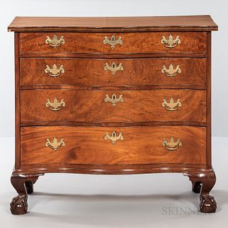 Chippendale Carved and Inlaid Mahogany Reverse-serpentine Chest of Drawers, Massachusetts, c. 1770-80, the shaped top with crossbanded
