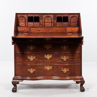 Chippendale Oxbow Serpentine Slant-lid Desk, Massachusetts, c. 1760-80, the stepped interior of three carved fans above blocked drawers