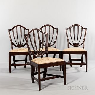Set of Four Carved Shield-back Side Chairs, Connecticut, early 19th century, the molded shields surrounding four carved spindles termin