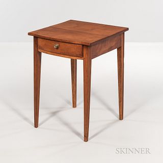 Federal Carved Cherry One-drawer Stand, New England, c. 1810-15, the overhanging top with square corners and swelled front on square mo